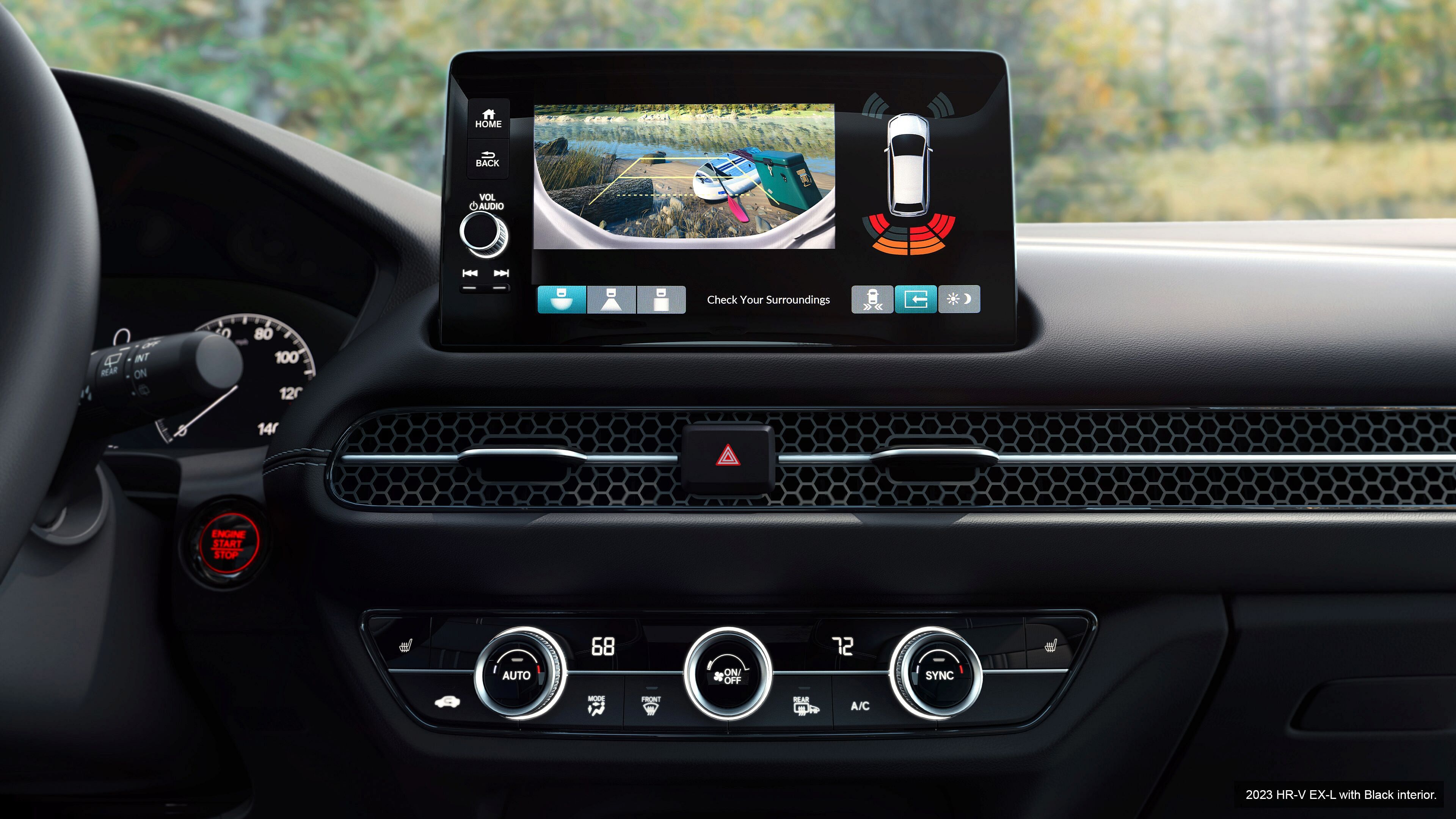Display Audio touchscreen displaying reversing camera in the Honda HR-V EX-L 2023 with black interior.